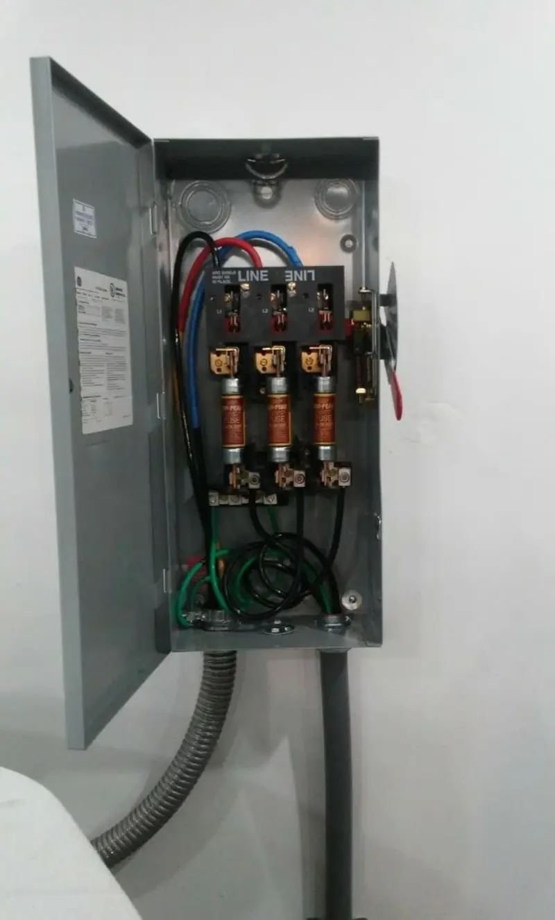 Three-phase disconnect switch installed for Smoke Detector Installation in Grayling