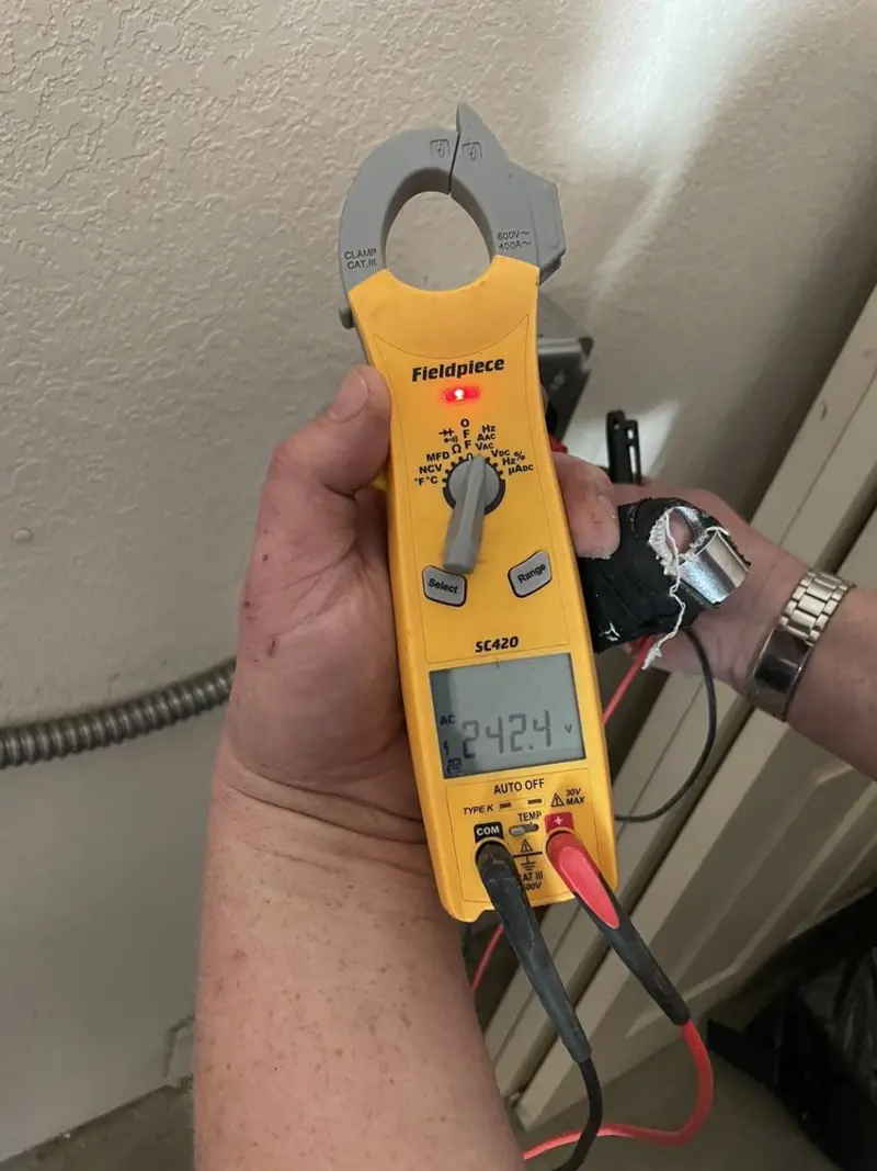 Voltage testing with clamp meter during Generator Installation in Grayling
